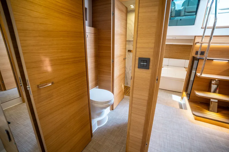Slide: The Image of Luxurious interior of 2025 De Antonio Yachts D50 OPEN with modern wooden finishes. - 45