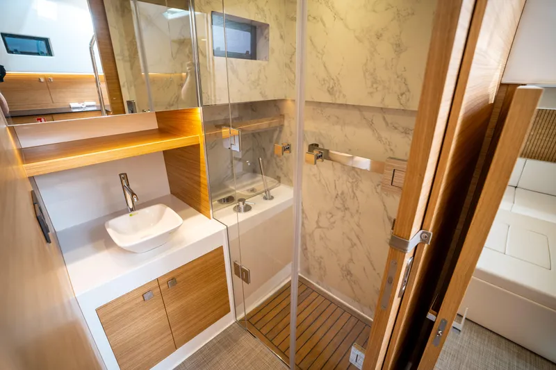 Slide: The Image of Luxurious bathroom interior of 2025 De Antonio Yachts D50 OPEN with modern fixtures. - 47
