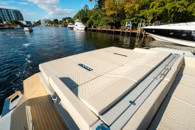 Slide: The Image of 2025 De Antonio Yachts D50 OPEN on a scenic waterway, showcasing luxury design and comfort. - 9