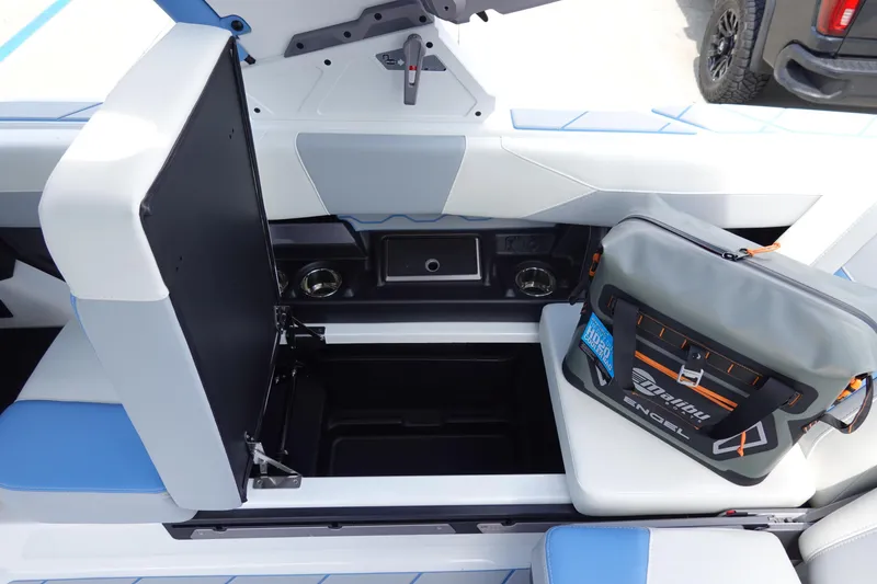 Slide: The Image of 2025 Malibu 23 LSV WAKESETTER interior storage with bag, showcasing sleek design and functionality. - 17