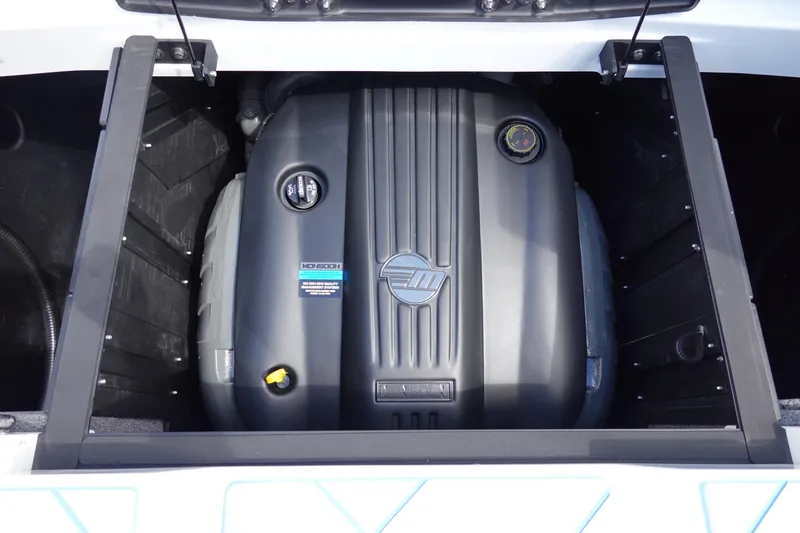 Slide: The Image of 2025 Malibu 23 LSV WAKESETTER engine compartment, showcasing powerful marine engine design. - 29