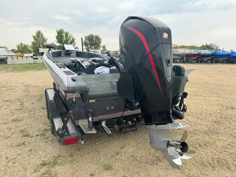 Slide: The Image of 2023 Warrior V2090 boat with powerful outboard motor on a trailer. - 4