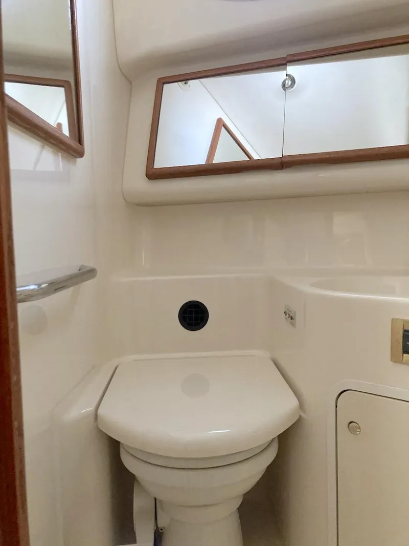 Slide: The Image of Bathroom interior of 2000 Sea Ray 400 Sedan Bridge yacht. - 9