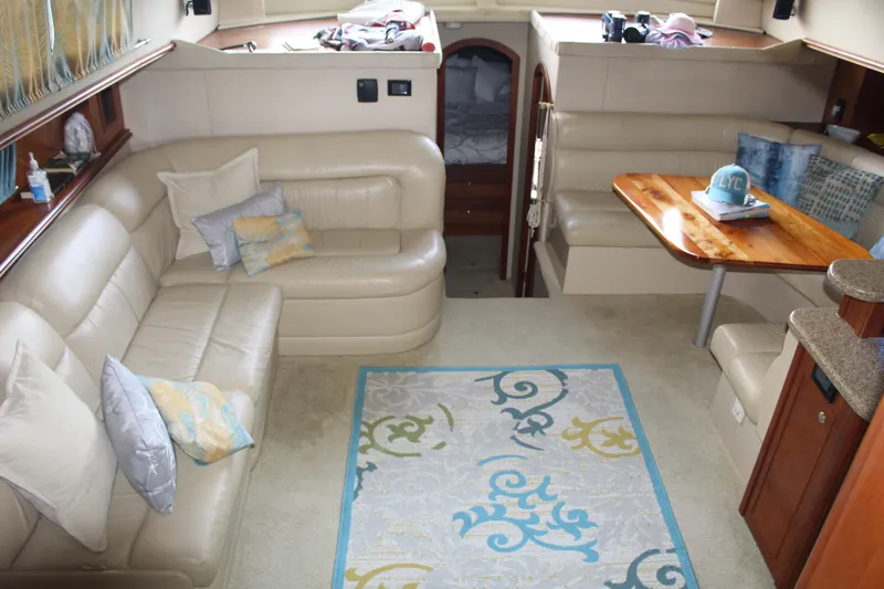 Slide: The Image of Luxurious interior of 2005 Cruisers 455 Express Motor Yacht with leather seating and elegant decor. - 15