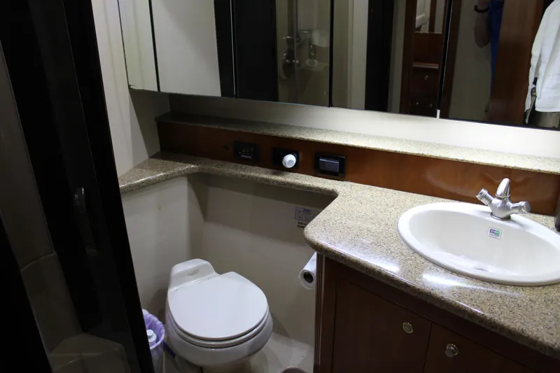 Slide: The Image of Luxurious bathroom in 2005 Cruisers 455 Express Motor Yacht with modern fixtures. - 32