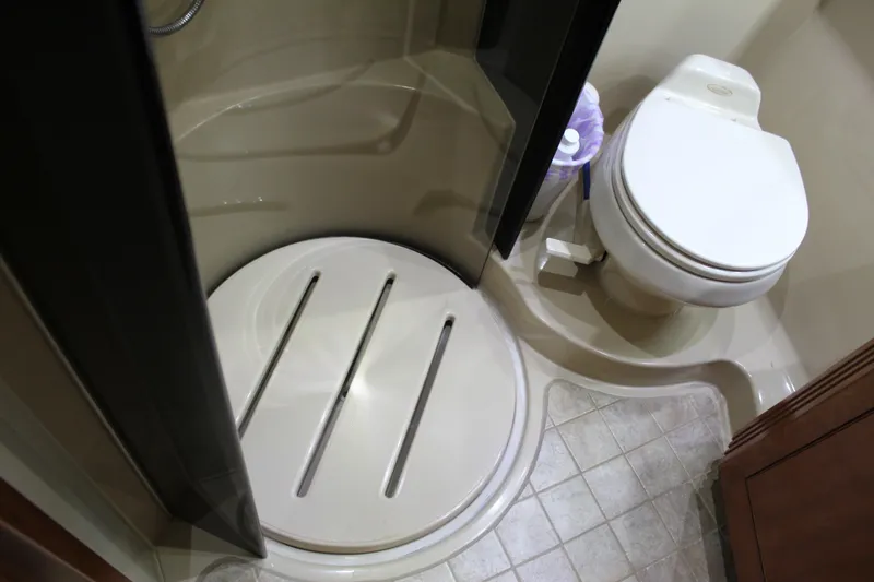 Slide: The Image of Bathroom interior of 2005 Cruisers 455 Express Motor Yacht with shower and toilet. - 33