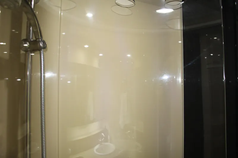 Slide: The Image of Shower area in 2005 Cruisers 455 Express Motor Yacht bathroom. - 34