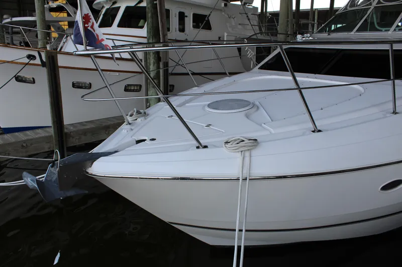 Slide: The Image of 2005 Cruisers 455 Express Motor Yacht docked at marina. - 6