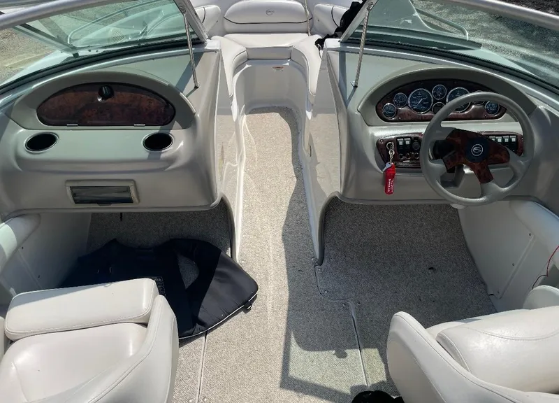 Slide: The Image of 2005 Crownline Runabout boat interior with steering wheel and seating. - 3
