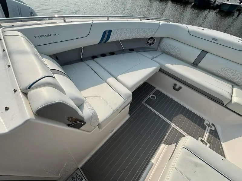 Slide: The Image of Luxurious 2022 Regal LX36 boat interior with spacious seating and elegant design. - 10