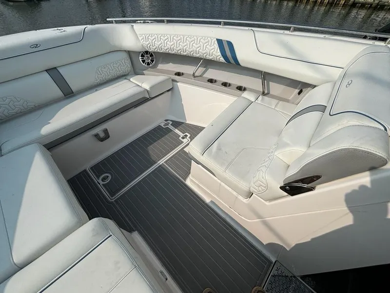Slide: The Image of Luxurious seating area on 2022 Regal LX36 boat with elegant upholstery and sleek design. - 11