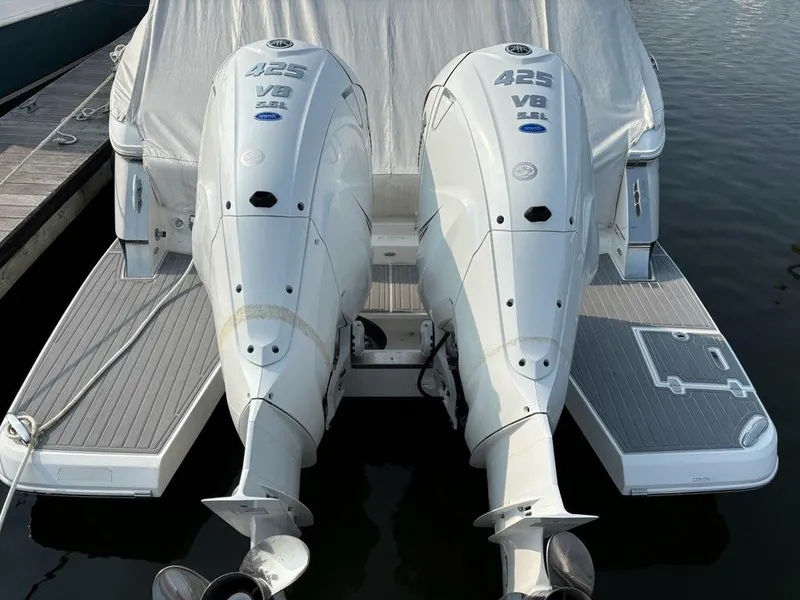 Slide: The Image of 2022 Regal LX36 boat with twin 425 V8 outboard engines at dock. - 9