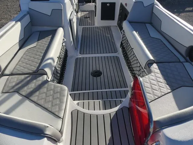 Slide: The Image of 2023 Caravelle Powerboats 251 XL with Suzuki outboard motor on trailer. - 11