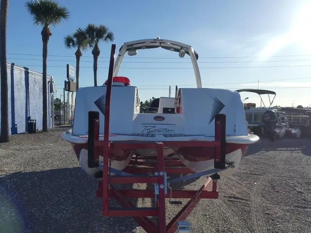 Slide: The Image of 2023 Caravelle Powerboats 251 XL in vibrant red on a trailer. - 3