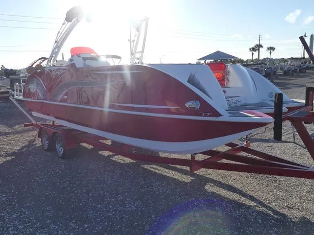 Slide: The Image of 2023 Caravelle Powerboats 251 XL in red on trailer, rear view. - 4