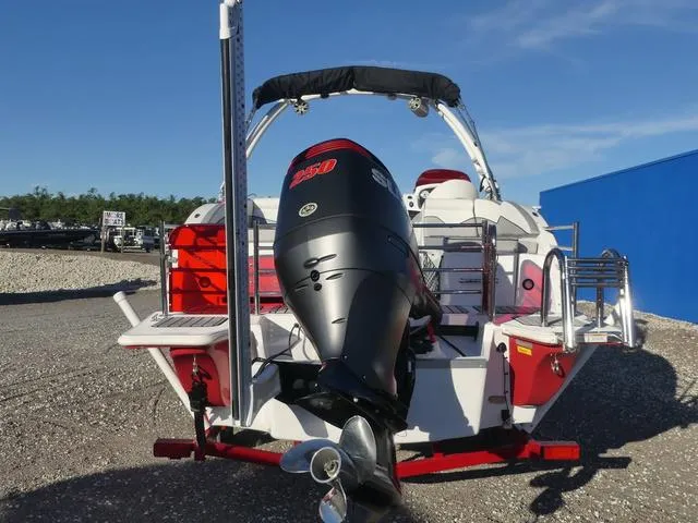 Slide: The Image of 2023 Caravelle Powerboats 251 XL, red, on trailer, side view. - 7