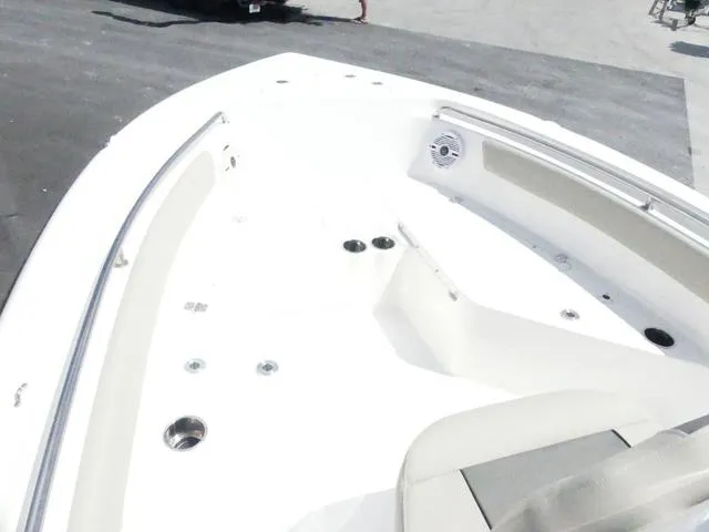 Slide: The Image of 2025 Key West 203 FS boat deck with seating and cup holders. - 14