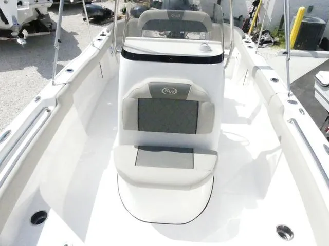 Slide: The Image of 2025 Key West 203 FS boat interior with seating and console. - 15