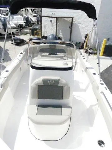 Slide: The Image of 2025 Key West 203 FS boat interior with seating and console. - 16