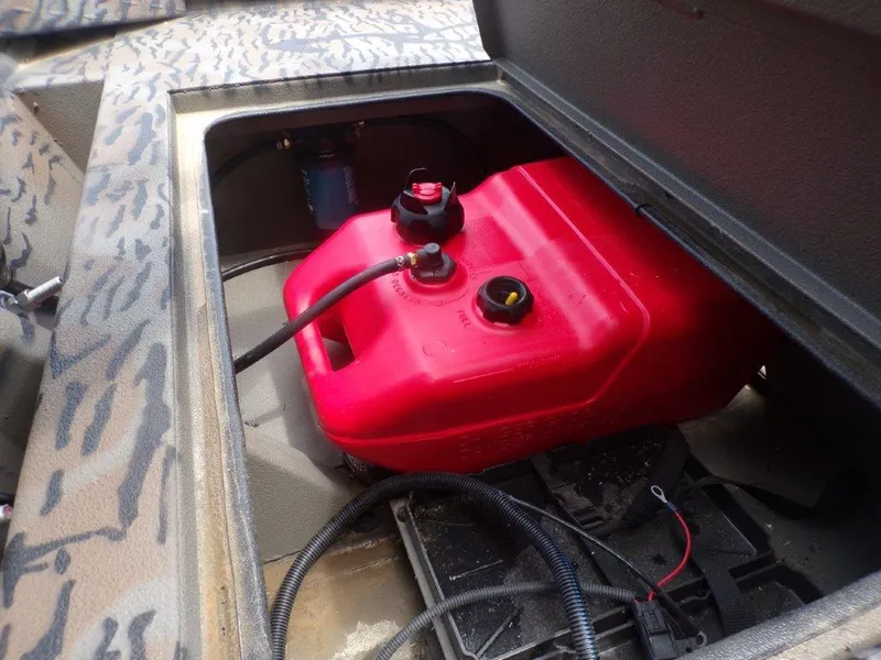 Slide: The Image of Red fuel tank in 2024 Xpress HD15DBX boat compartment. - 5