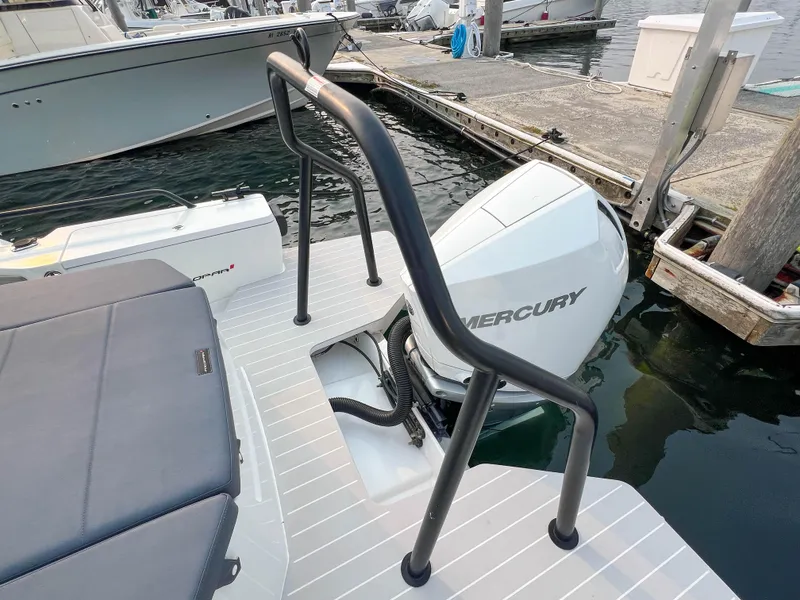 Slide: The Image of Axopar 28 CABIN 2020 with Mercury outboard engine at dock. - 22