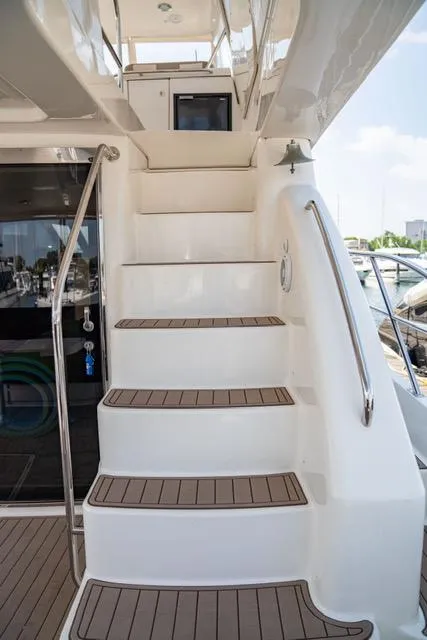 Slide: The Image of Staircase on 2005 Neptunus 62 Flybridge yacht, leading to upper deck. - 20