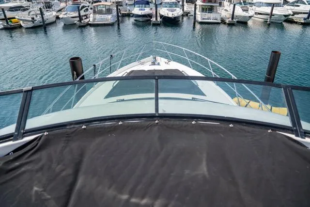 Slide: The Image of Neptunus 62 Flybridge 2005 yacht docked in marina, view from flybridge. - 32