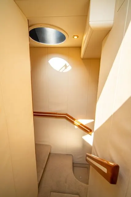 Slide: The Image of Interior staircase of 2005 Neptunus 62 Flybridge yacht with skylight. - 33