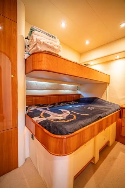 Slide: The Image of Luxurious cabin interior of 2005 Neptunus 62 Flybridge yacht with cozy bedding. - 45