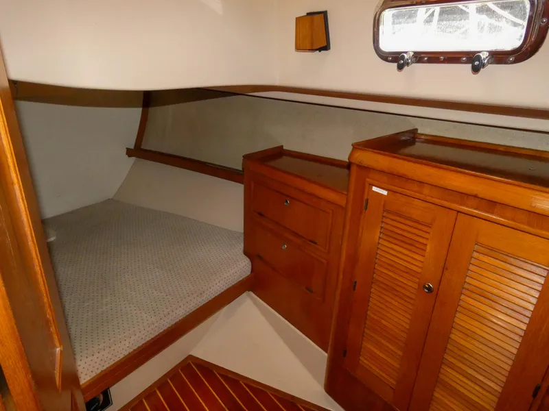 Slide: The Image of Interior of 2002 Island Packet 420 yacht with wooden furnishings. - 21