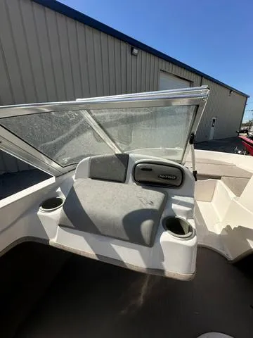 Slide: The Image of 2005 Sun Tracker 189 SPORT boat interior with seating and cup holders. - 8