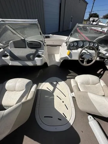 Slide: The Image of 2005 Sun Tracker 189 SPORT boat interior with steering wheel and seating. - 9