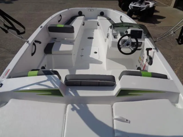 Slide: The Image of 2024 Tahoe T18 boat interior with modern seating and steering wheel. - 6