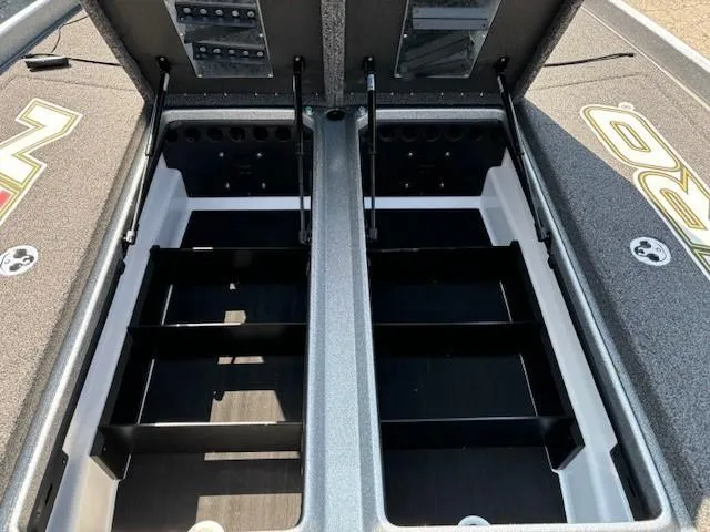 Slide: The Image of 2023 Nitro Z21 XL boat storage compartments with open lids. - 14