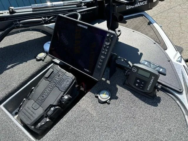 Slide: The Image of 2023 Nitro Z21 XL boat dashboard with Lowrance electronics and controls. - 18