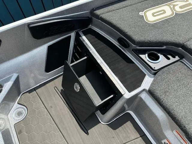Slide: The Image of 2023 Nitro Z21 XL boat interior with storage compartment and sleek design. - 26