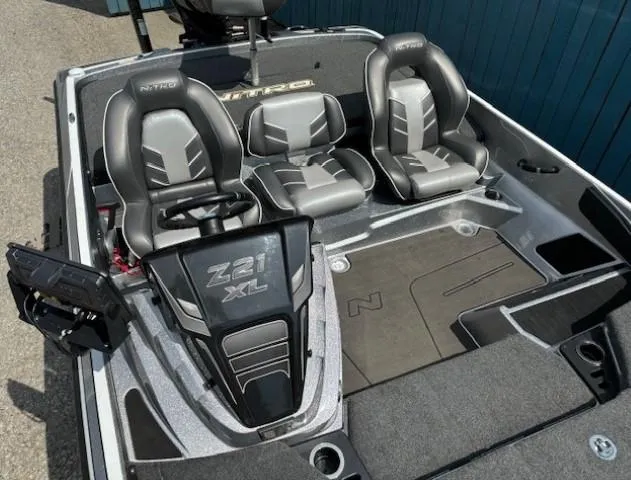 Slide: The Image of 2023 Nitro Z21 XL boat interior with sleek seating and modern design. - 27
