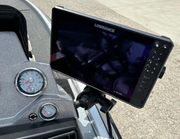Slide: The Image of Lowrance fishfinder on 2023 Nitro Z21 XL boat dashboard with gauges. - 30