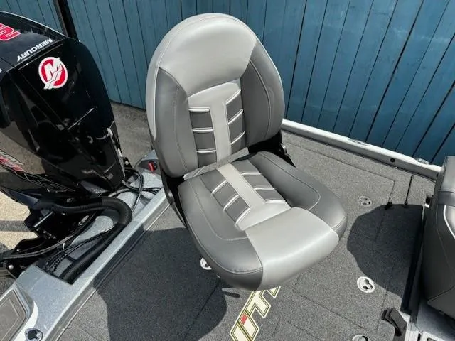 Slide: The Image of 2023 Nitro Z21 XL boat seat with Mercury engine in background. - 39
