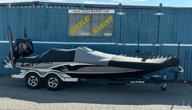 Slide: The Image of 2023 Nitro Z21 XL boat on trailer, covered, parked at Sizzle Marine. - 45