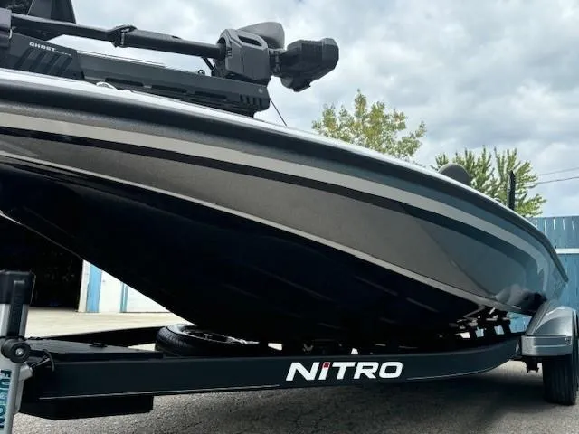 Slide: The Image of 2023 Nitro Z21 XL boat on trailer, sleek design, outdoor setting. - 5