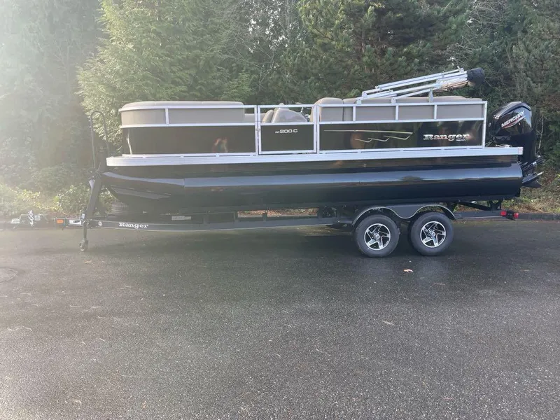 The Image of 2024 Ranger Reata 200C boat on trailer, front view. - 0