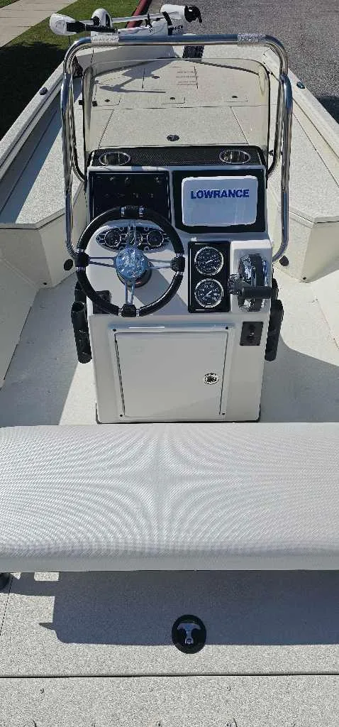Slide: The Image of 2024 Ranger RB200 boat console with steering wheel and Lowrance display. - 4