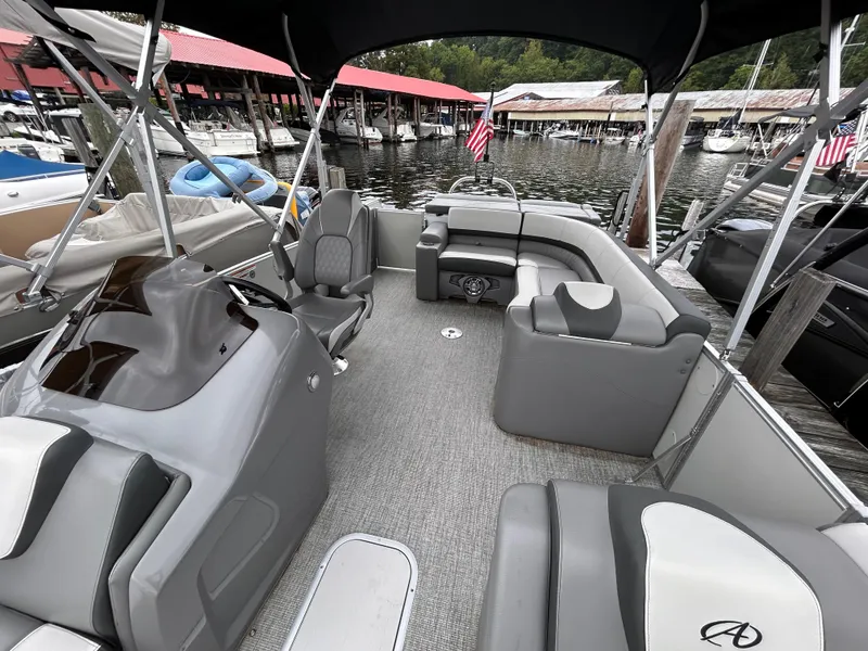 Slide: The Image of 2021 Avalon Catalina Cruise 25 pontoon boat interior at marina. - 18