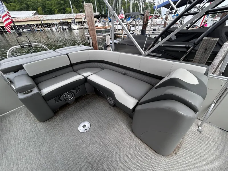 Slide: The Image of Luxurious seating on 2021 Avalon Catalina Cruise 25 boat at marina. - 24
