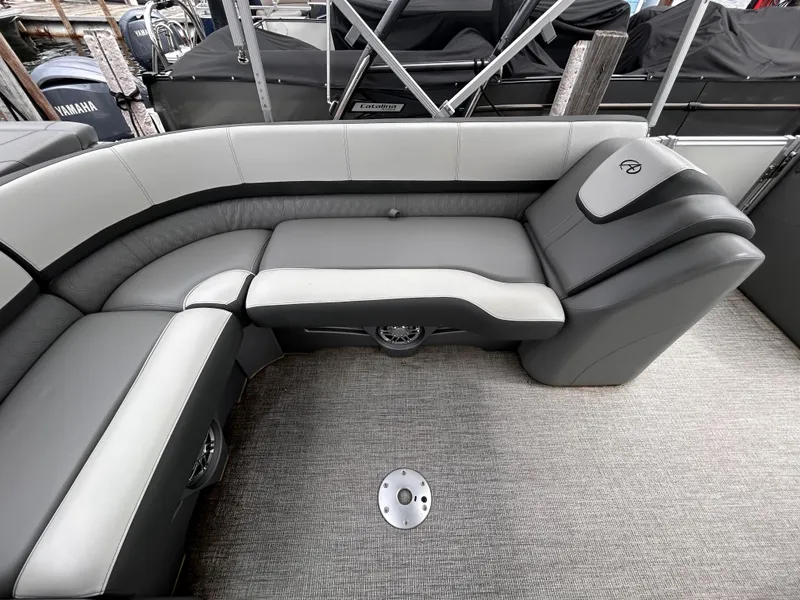 Slide: The Image of Avalon Catalina Cruise 25 boat interior, 2021 model, featuring gray seating and carpeted flooring. - 27