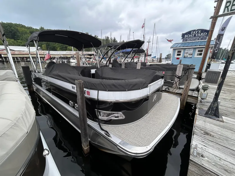 Slide: The Image of 2021 Avalon Catalina Cruise 25 pontoon boat docked at marina. - 3