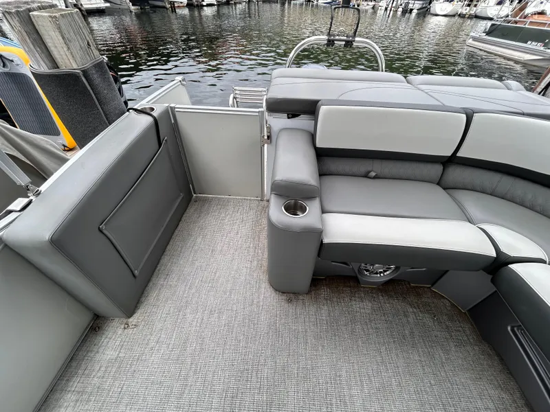 Slide: The Image of Avalon Catalina Cruise 25 boat interior, 2021 model, featuring gray seating and carpeted flooring. - 32