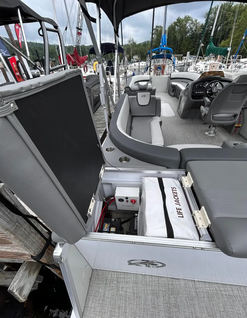 Slide: The Image of 2021 Avalon Catalina Cruise 25 boat interior with seating and life jackets. - 37