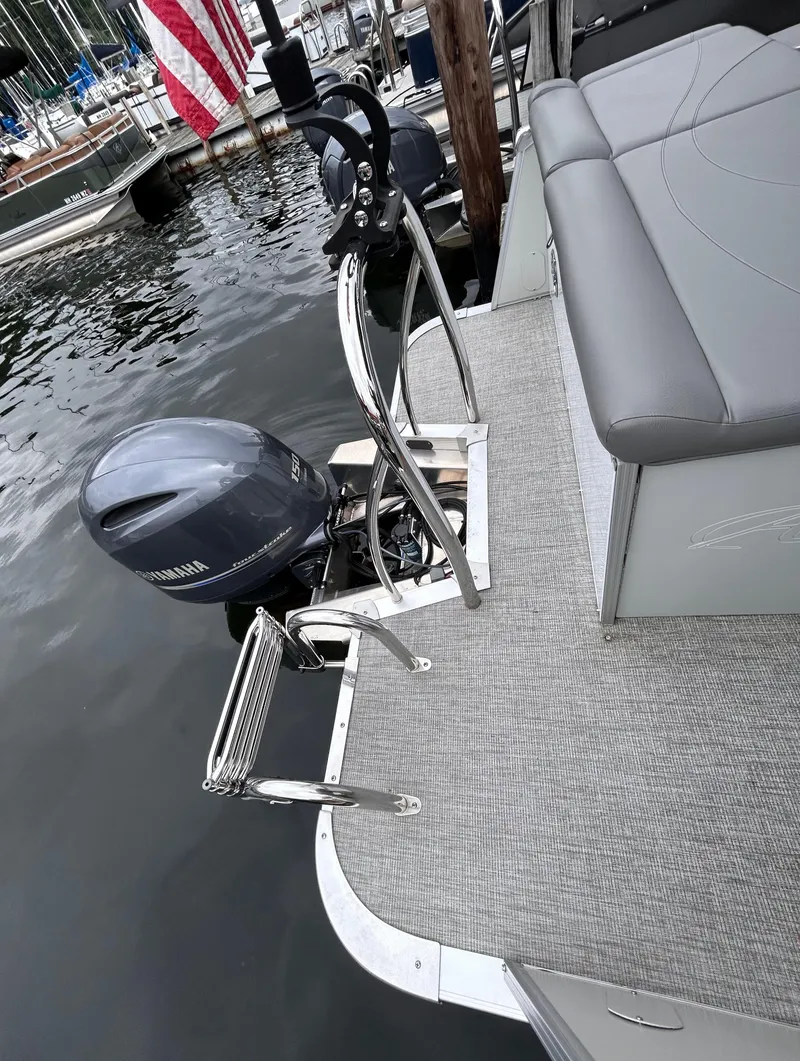 Slide: The Image of 2021 Avalon Catalina Cruise 25 boat with Yamaha motor at dock. - 38